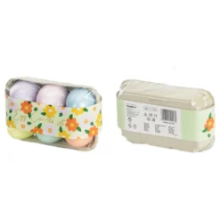 Pastellinsävyiset munanmuotoiset steariinikynttilät